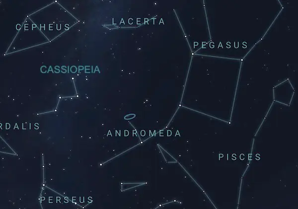 Star chart with blinking yellow arrow from Cassiopeia to Andromeda galaxy.