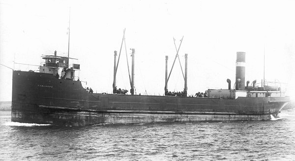Black and white image of an old ship with a wide bow.