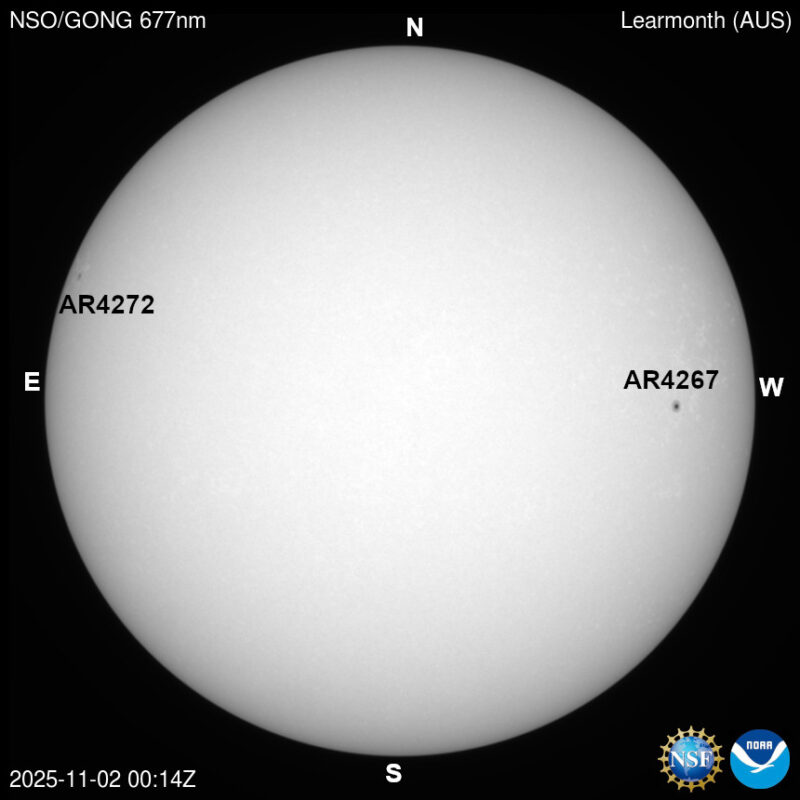 The sun, seen as a large white sphere with dark spots, each labeled.