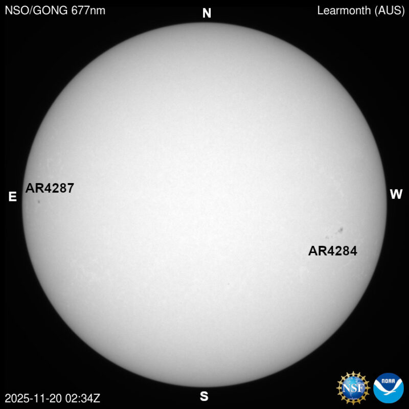 The sun, seen as a large white sphere with dark spots, each labeled.