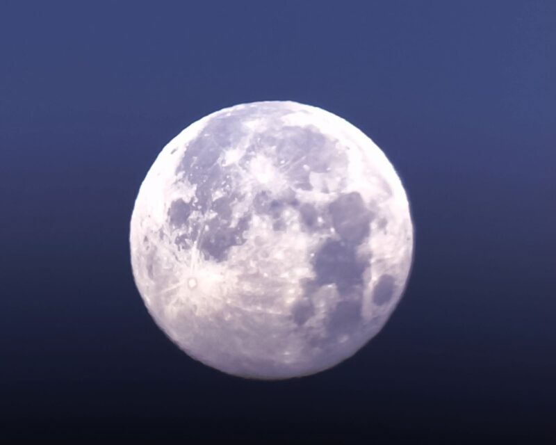 A bright white full moon.