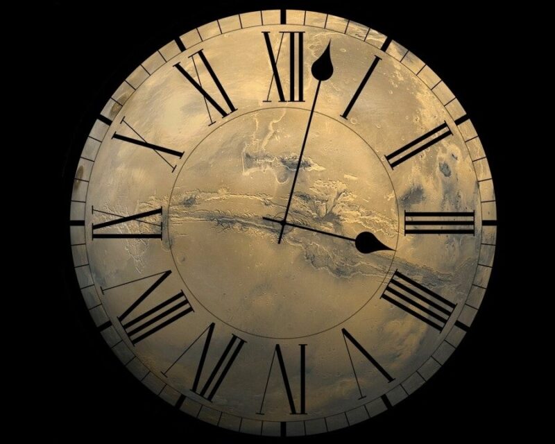 What time is it on Mars? Mars in the background with the face of a clock over top.