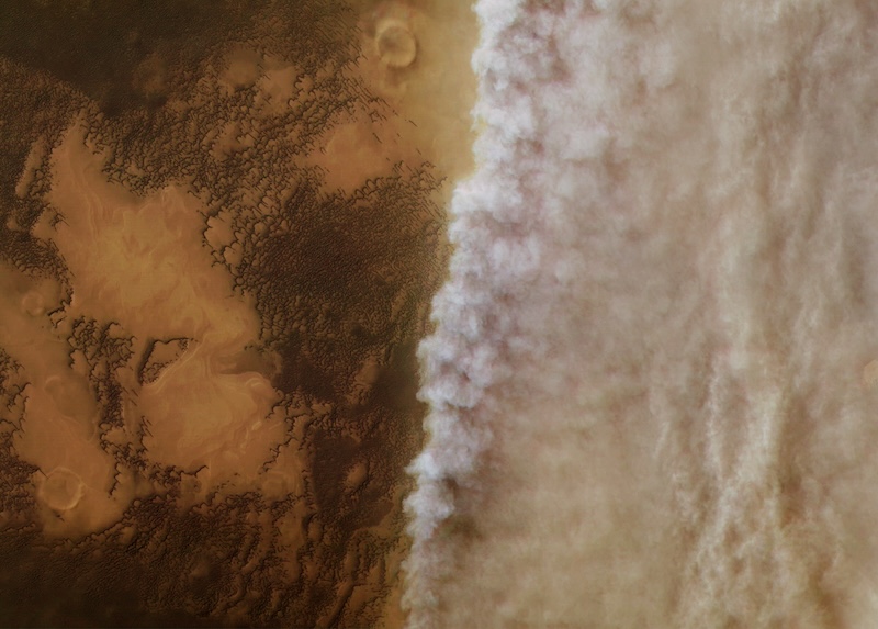 Lightning on Mars: Long wall of thick dust moving over reddish-brown landscape as seen from above.