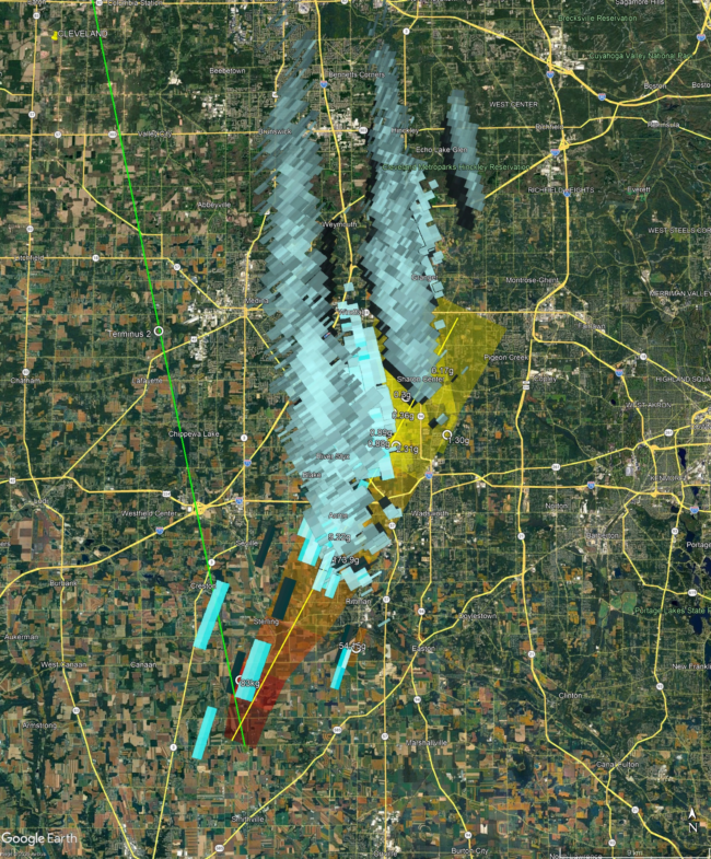 MOrbital view of landscape overlaid with large blue streaks over strewn field.