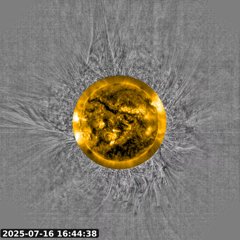An orange space telescope view of the sun in the center, surrounded by a greyscale view showing slow solar wind streaming outwards.
