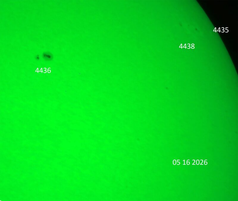 The sun, seen as a green sectional sphere with dark spots, each labeled.