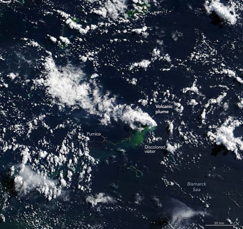 Undersea volcano: Satellite view of water with white clouds and a white plume, plus greenish and brown patches in the water.