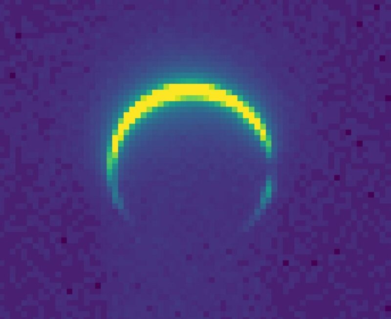 A yellow bit-mapped crescent wrapped around a dark circle, in a blue field.