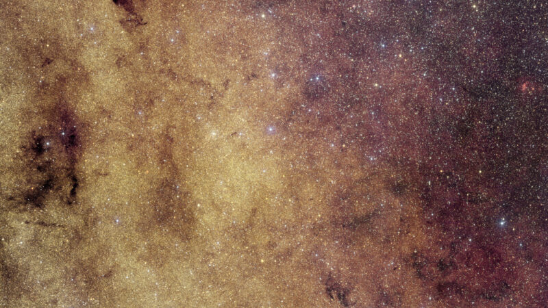 Milky Way's core: A crowded starfield showing countless stars in white and yellow with a few dark nebulae.