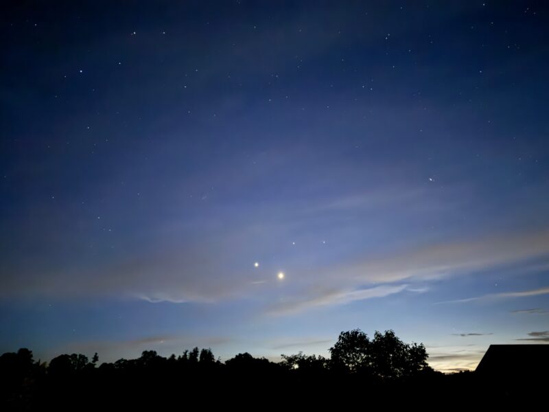 Wide view of the sky with many bright dots, 2 of them stand out the most.