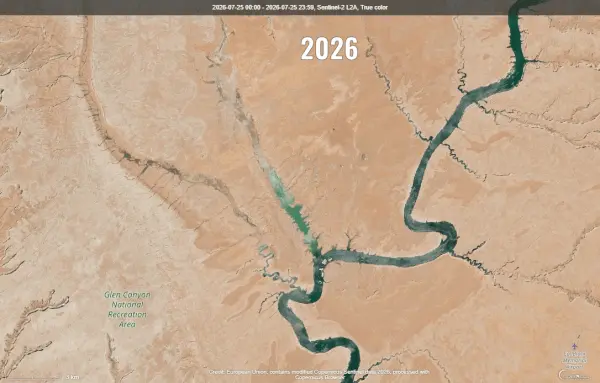 2 alternating orbital views of a large lake inlet, one with it thin, one with it wide.