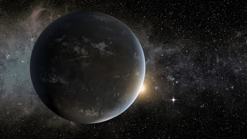 Rocky planet with patches of white clouds. Its sun is just peeking out from behind the planet.