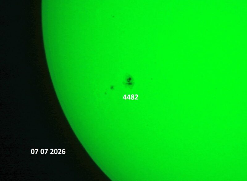 The sun, seen as a green sectional sphere with dark spots, each labeled.