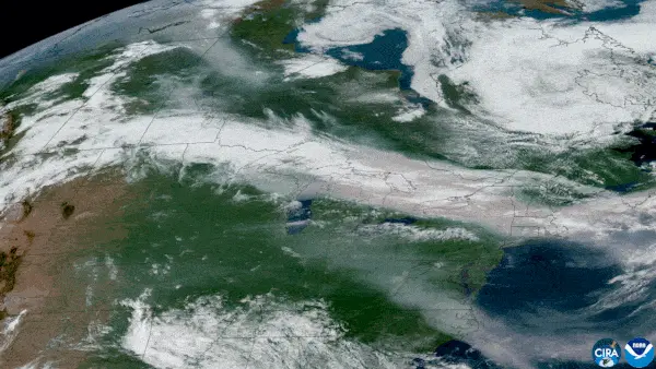 Animated orbital view of a wide stream of smoke flowing from northern North America into the Atlantic.