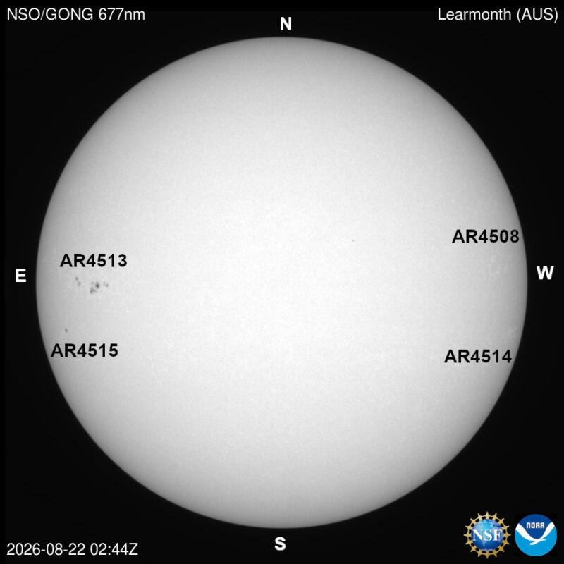 The sun, seen as a large white sphere with dark spots, each labeled.