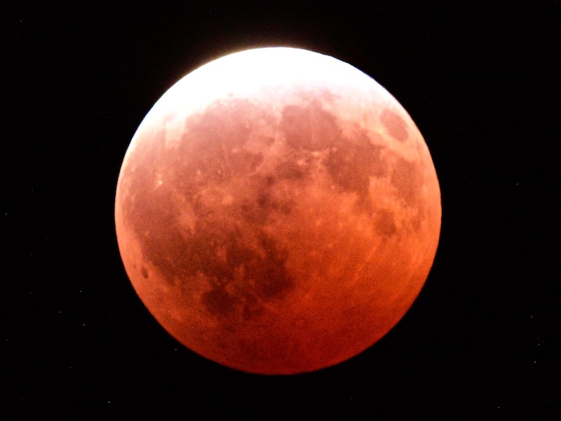 The full moon, nearly all red.