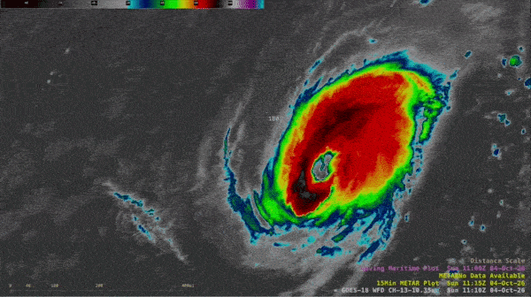 Hurricane Nolo: A large, colorful oval swirl with a central eye spins westward.
