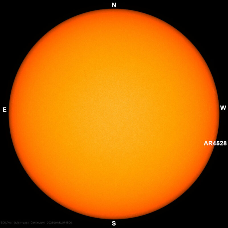 The sun, seen as a large yellow sphere with dark spots, each labeled.