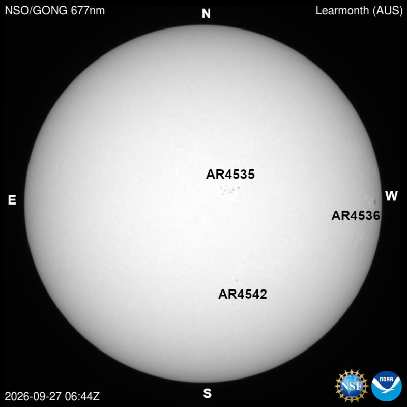 The sun, seen as a large white sphere with dark spots, each labeled.