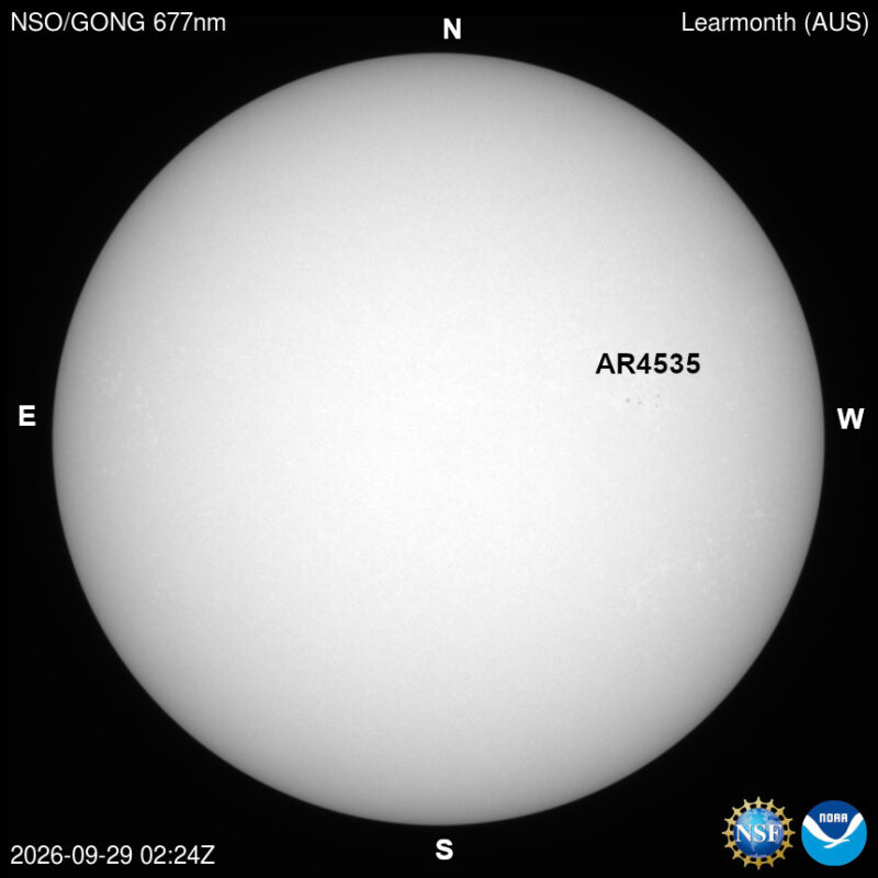 The sun, seen as a large white sphere with dark spots, each labeled.