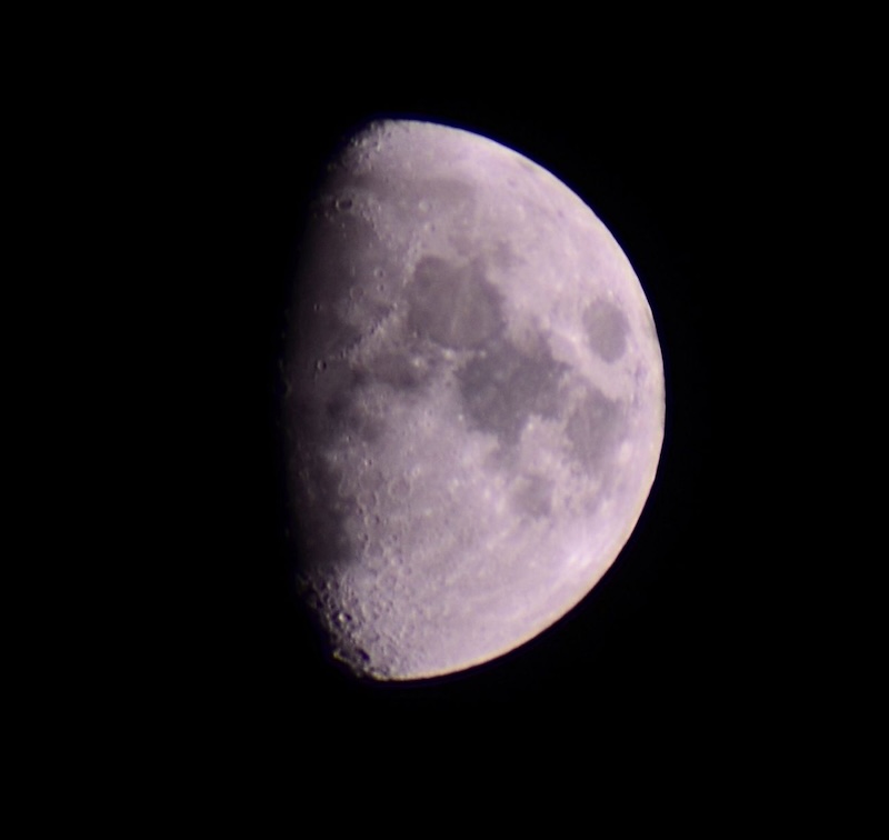 International Observe the Moon Night: Waxing gibbous moon against a black sky.