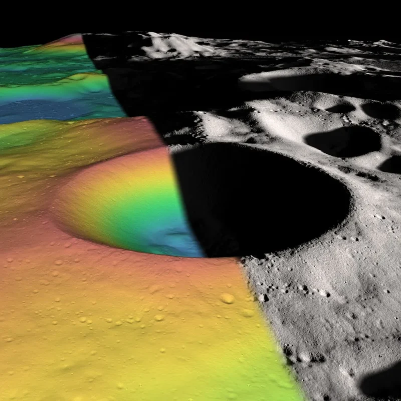 Moon crater with half in black and white and half in rainbow hues.