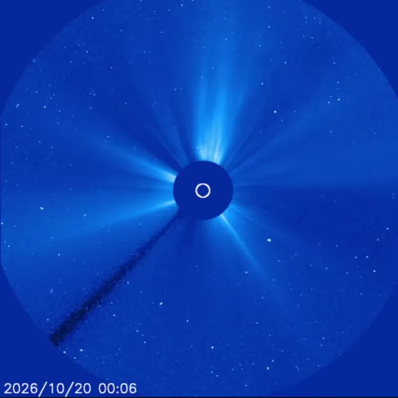 Blue coronagraph animation with the sun hidden behind a dark disk, as solar material erupts and Mercury drifts into view.