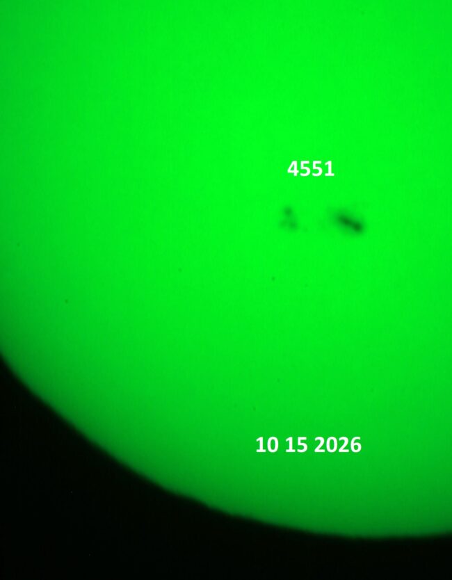 The sun, seen as a green sectional sphere with dark spots, each labeled.