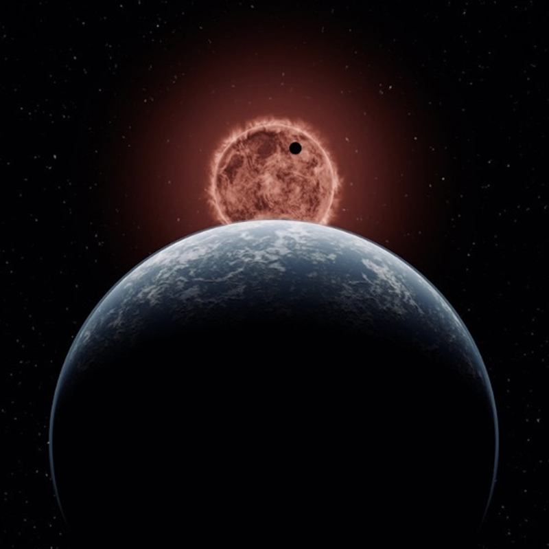 Big Earthlike world in the foreground with red sun i nthe background.