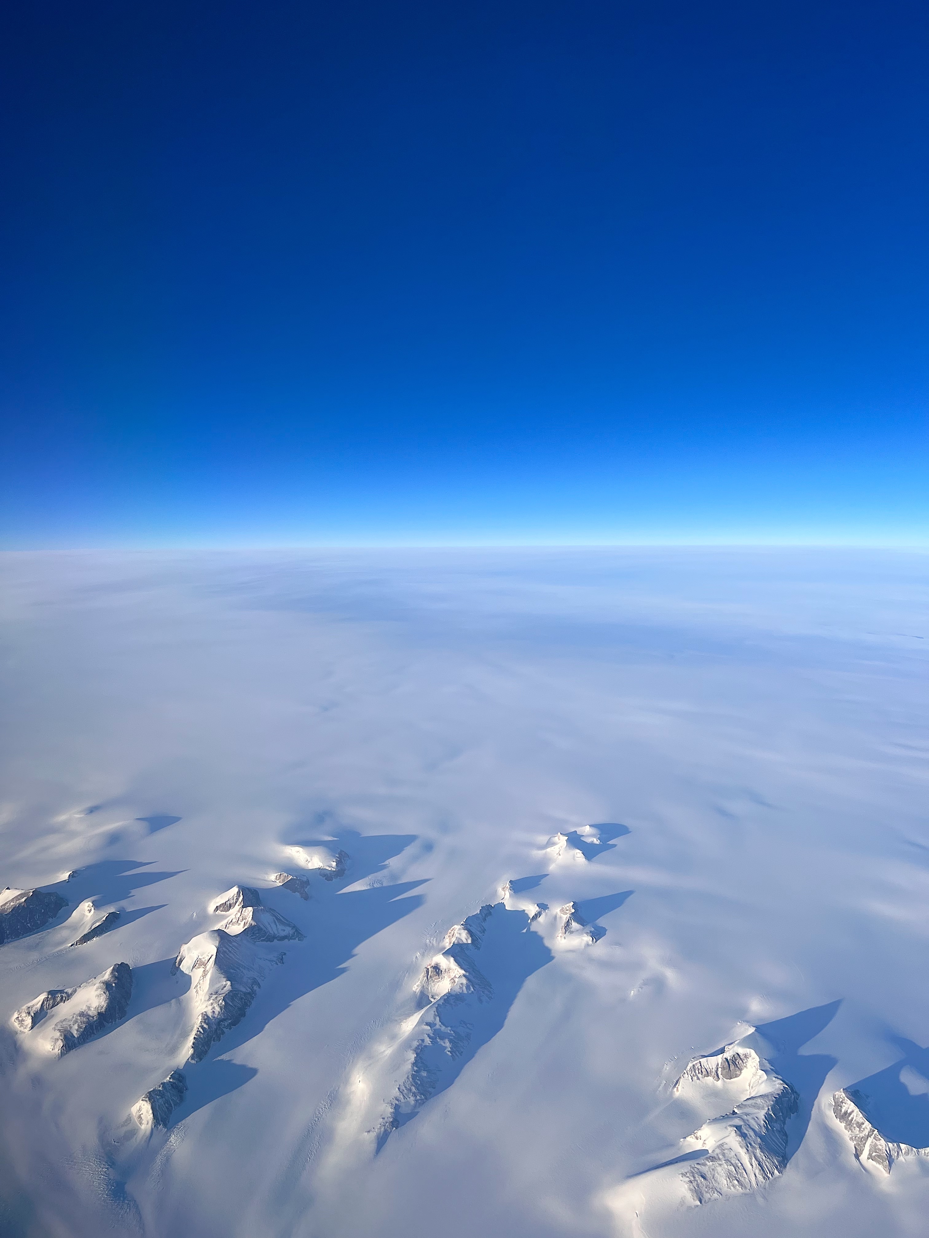 Community photo by Ailee Farey | 33k ft. above Greenland